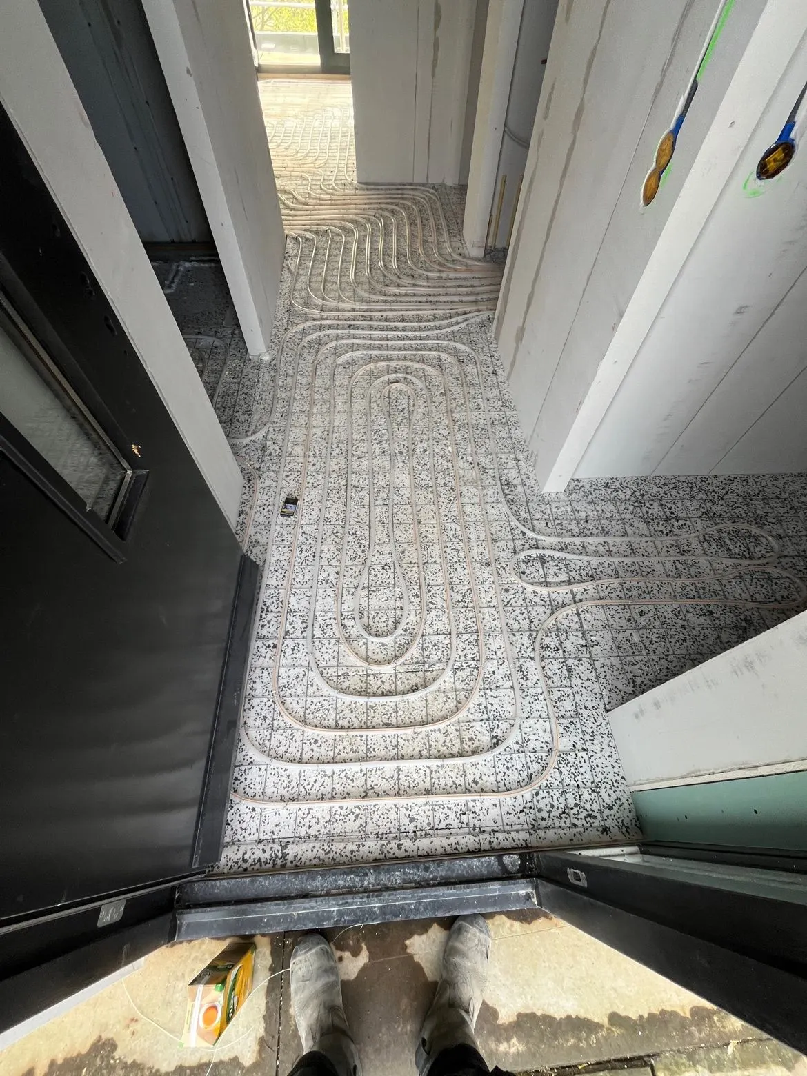 Vloerverwarming tot in de deuropening van een appartement